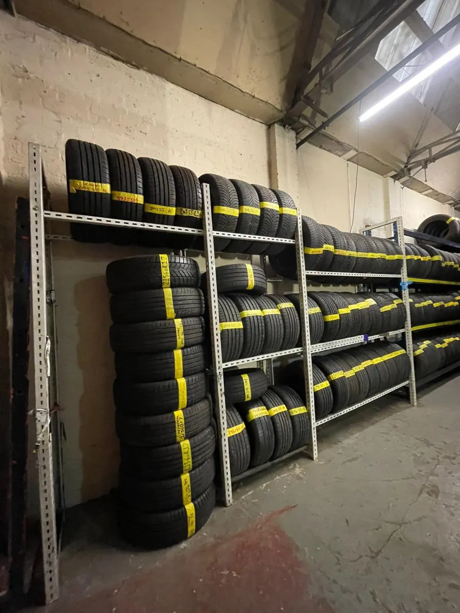 Racks of tyres in stock at the Paisley workshop
